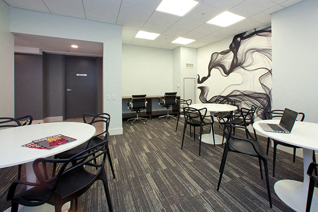 Cityview Apartments Common area with a smoky pattern on the wall in Brampton, ON