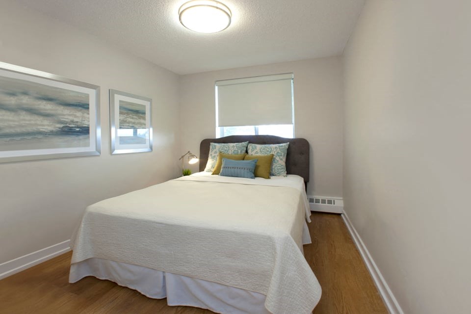 Dorchester Apartments bedroom with beautiful hard surface flooring in Niagara Falls, ON