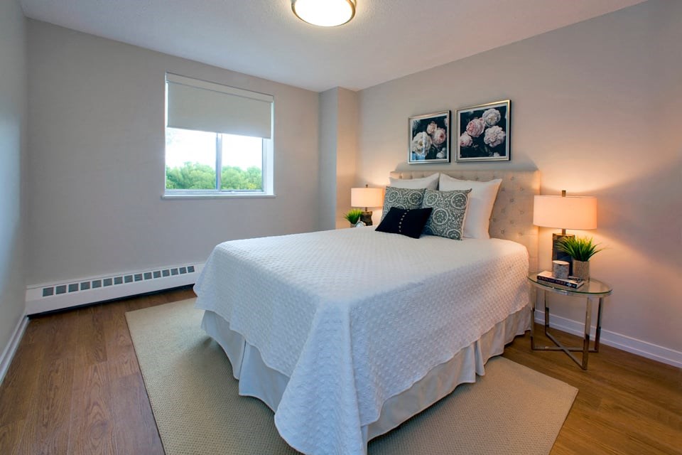 Dorchester Apartments large master bedroom with hard surface flooring in Niagara Falls, ON