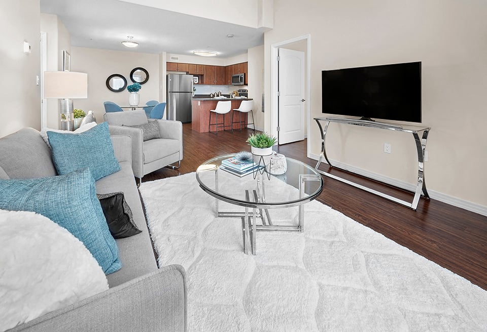 a living room with a couch and a table