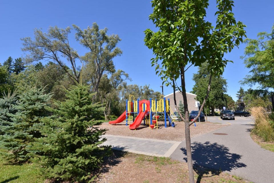 Playground in a park  at Creekside Townhomes in Oshawa, ON