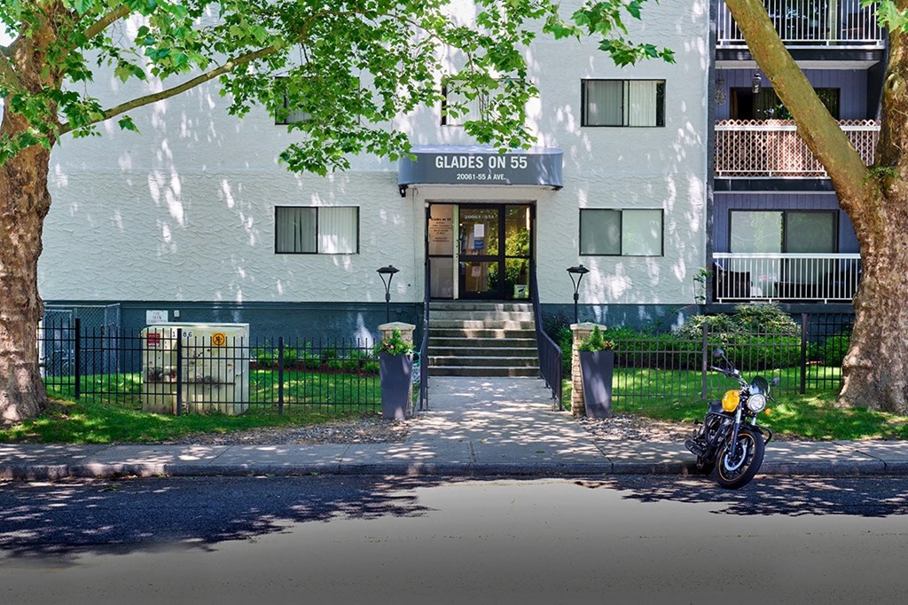 a motorcycle parked in front of a building