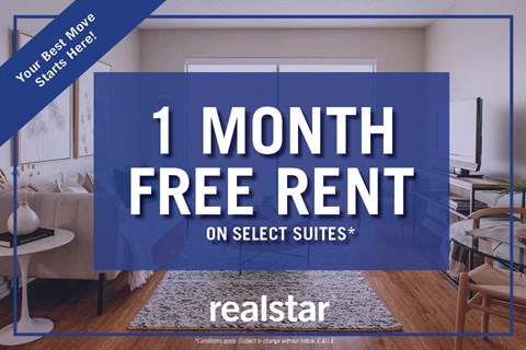 a living room with a couch and a rug and a free rent on select suites