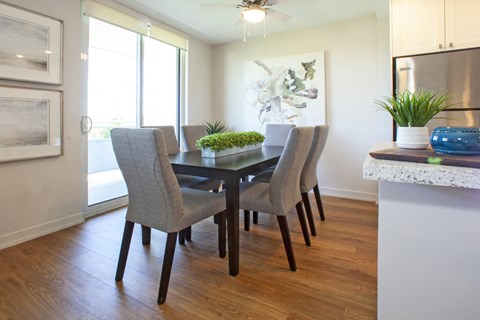 Harbourview Apartments dining area featuring walkout to balcony in Oakville, ON