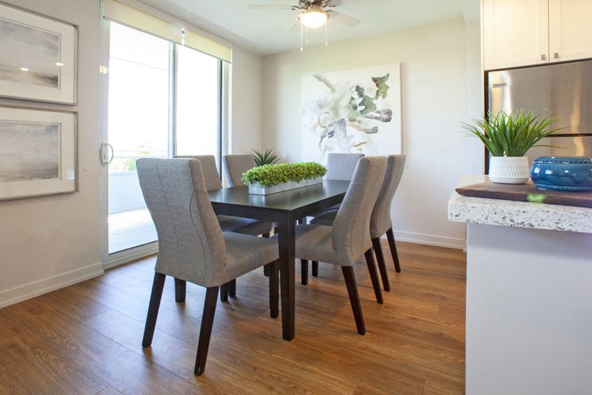 Harbourview Apartments dining area featuring walkout to balcony in Oakville, ON