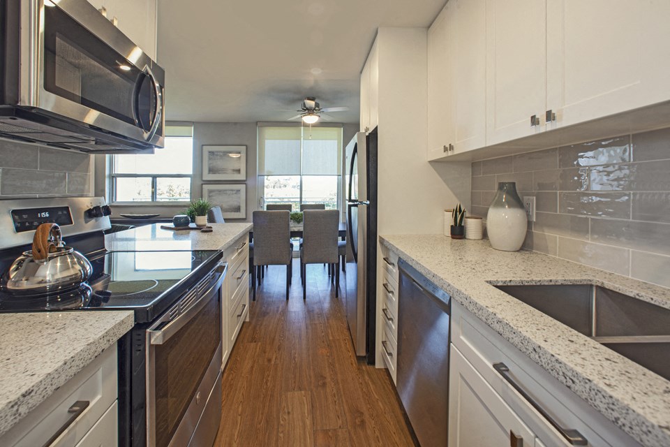 Harbourview Apartments kitchen featuring stainless steel appliances in Oakville, ON