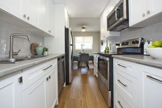 High Street Apartments Kitchen featuring stainless steal appliances in Fort Erie, Ontario