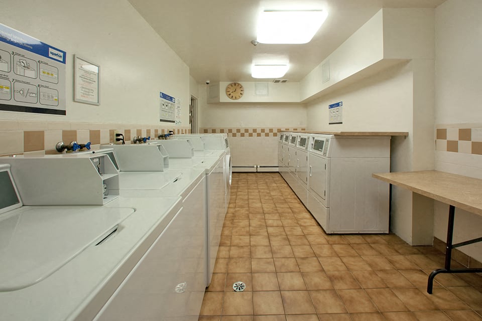 Shared laundry room at Hillcrest Terrace in St. Catharines, ON