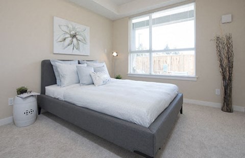 Hoylake Apartments in Victoria, BC large bedroom with window