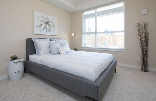 Hoylake Apartments in Victoria, BC large bedroom with window