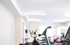 Hoylake Apartments in Victoria, BC gym with cardio and weight machines