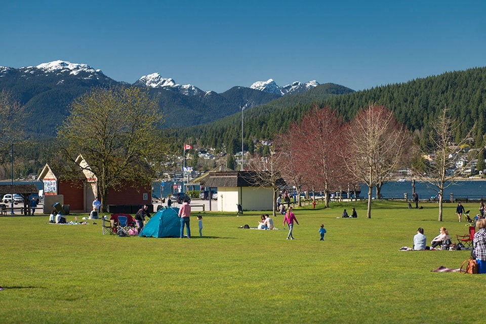 Inlet Glen Apartments in Port Moody, BC park with view of mountains