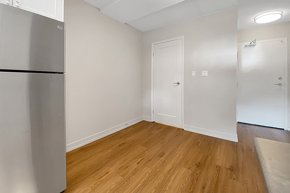 Kensington Apartments in Brockville dining room as seen from kitchen with entry on right side