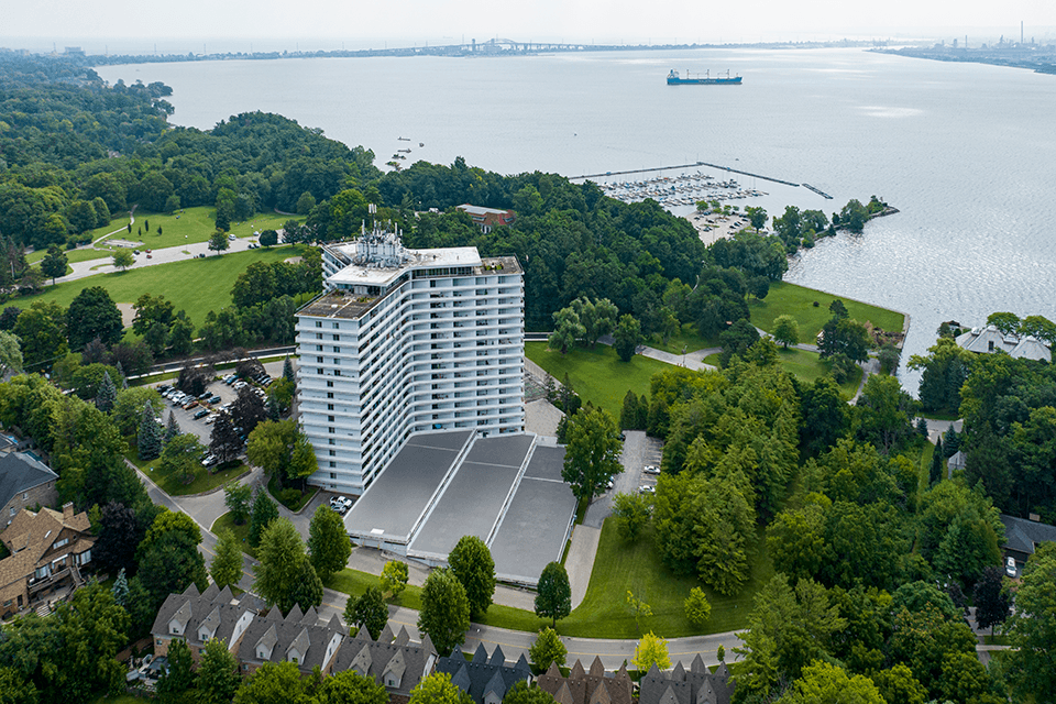 La Salle Towers building drone exterior featuring the lake and bridge in Burlington, ON