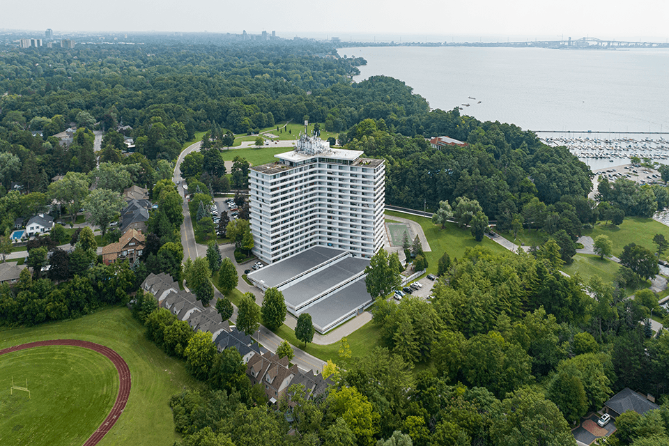 La Salle Towers building drone exterior featuring the lake in Burlington, ON