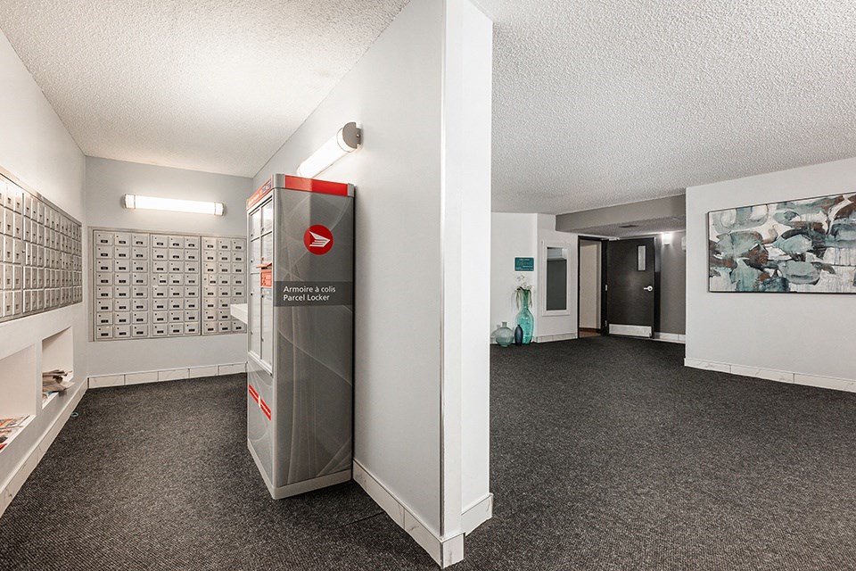 the lobby of a building with a vending machine