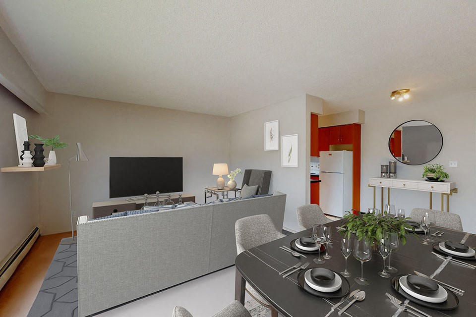 Linwood Court in Burnaby, BC open concept living and dining room