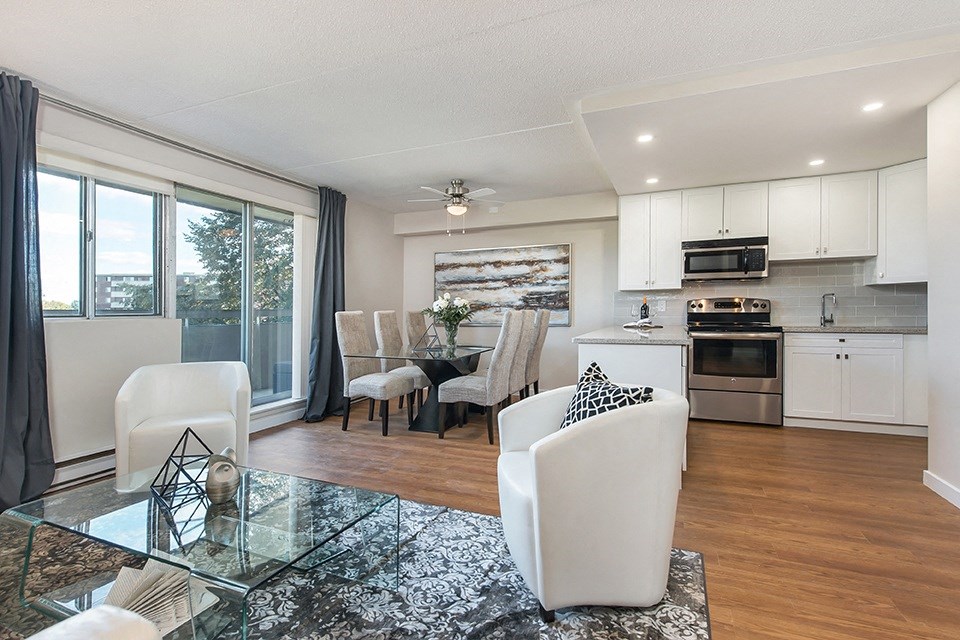 Lorneville Apartments open concept suite with view of kitchen and dining area from living room in Cornwall, ON