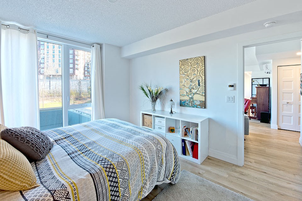 Lumineau in Sherbrooke, QC well lit bedroom and hard surface flooring throughout