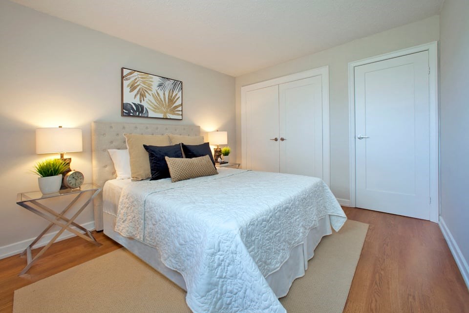 Lyndon Place spacious bedroom with hard surface flooring and large closet in Niagara Falls, ON