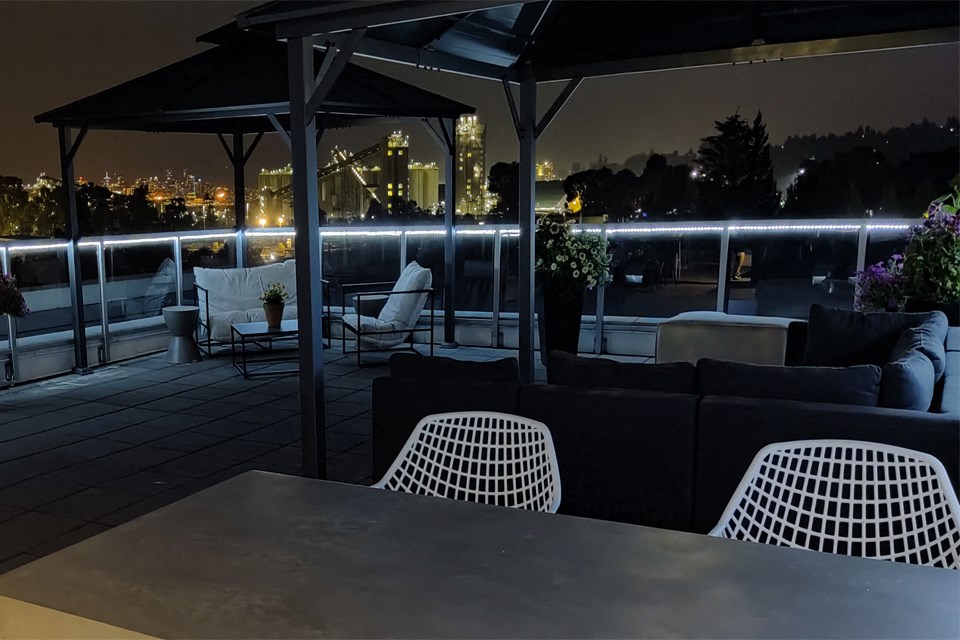 Lynn Creek in North Vancouver, BC drone image of rooftop patio night