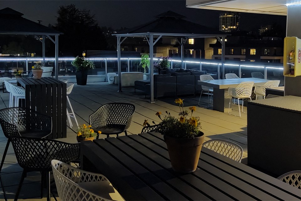 Lynn Creek in North Vancouver, BC drone image of rooftop patio night
