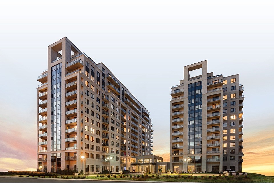 Two modern apartment buildings are shown in the image.