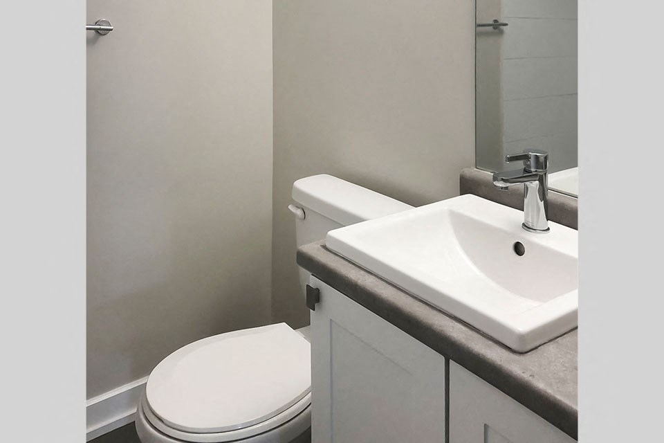 Miller Apartments in Sarnia. ON bathroom with upgraded cabinetry and countertop