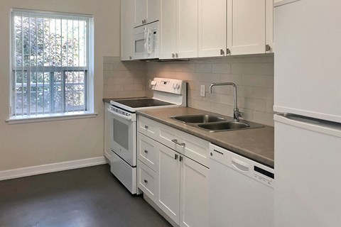 Miller Apartments in Sarnia. ON kitchen with modern cabinetry