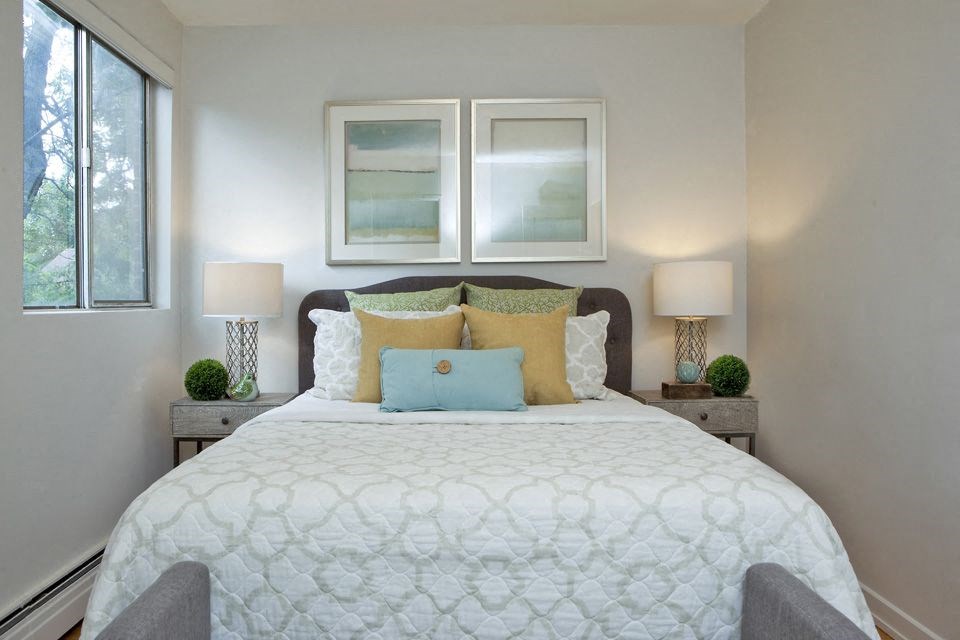 Millside Apartments in Milton, ON well lit bedroom