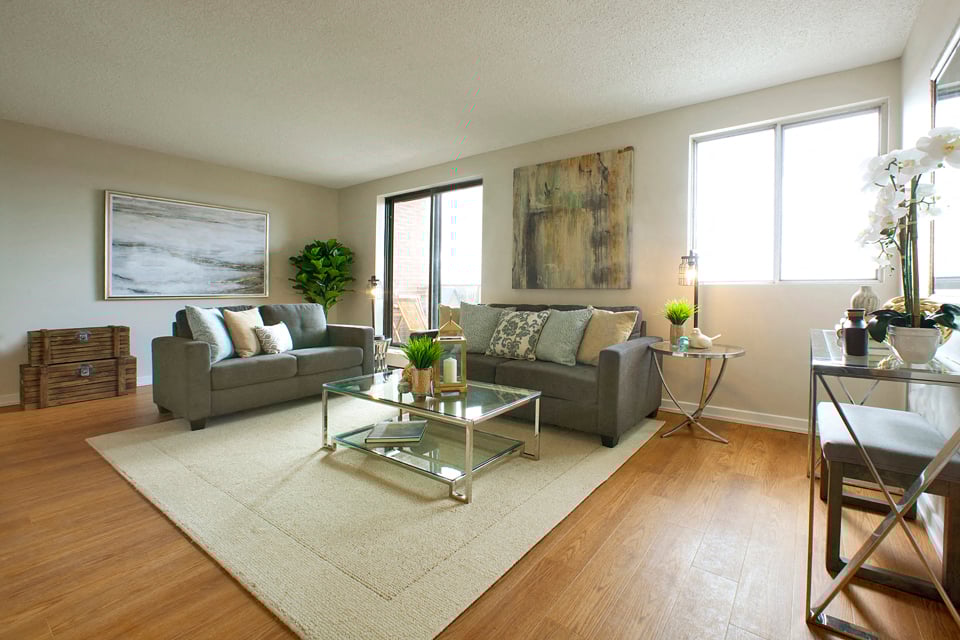 Millside Tower large living room with lots of natural light in Milton, ON