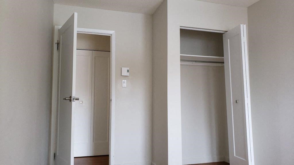Closet in a second bedroom in an revitalized suite at Moira Apartments in Belleville, ON.
