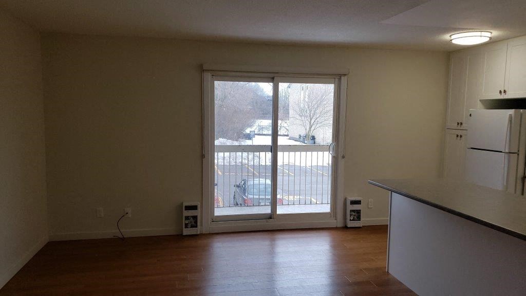 Open concept living area at Moira Apartments in Belleville, ON.