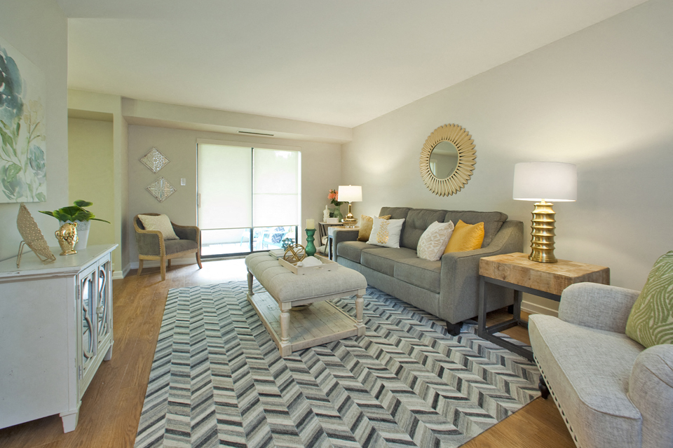 a living room with a couch and a table