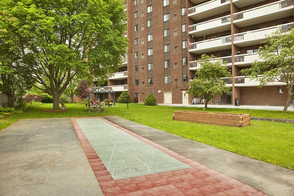 Outdoor shuffleboard area at Northgate Towers in Woodstock