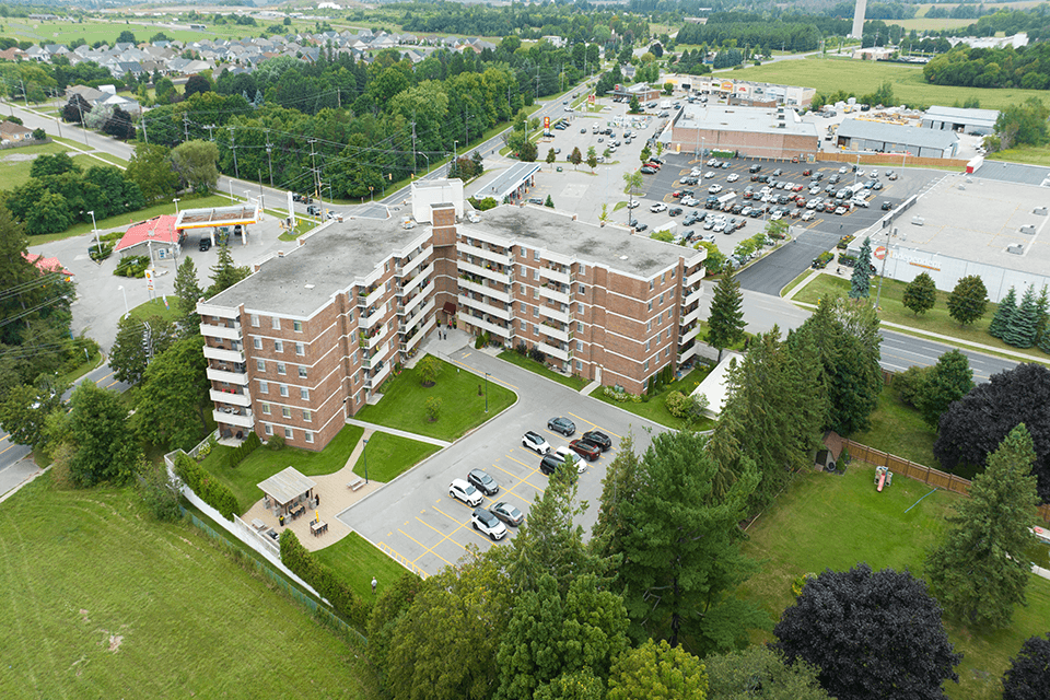 Northumberland Place image of drone exterior of building featuring the lake in Port Hope, ON