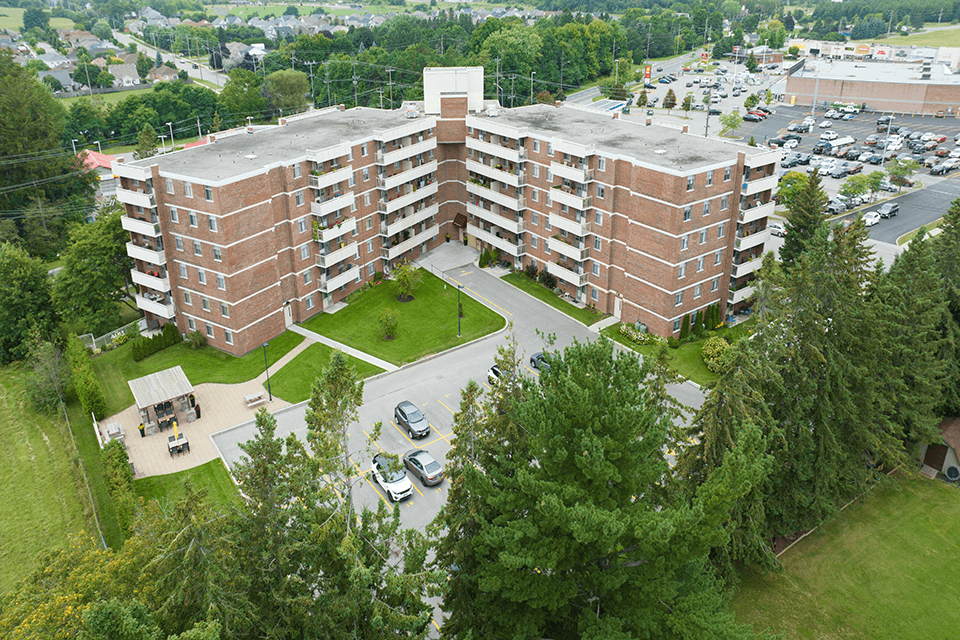 Northumberland Place image of drone exterior of building featuring the lake in Port Hope, ON