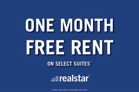 A blue advertisement for a one month free rent offer on select suites.
