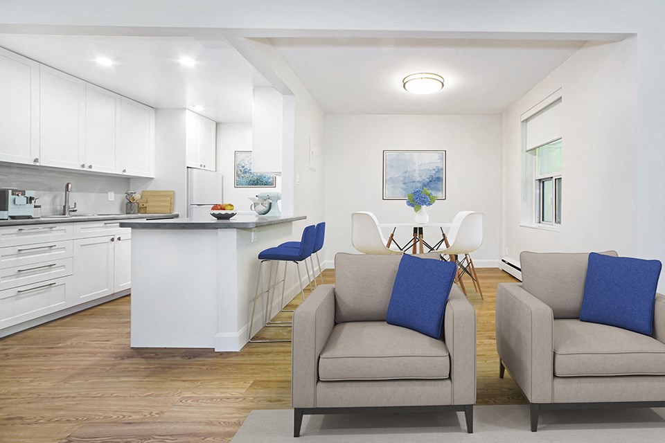 Park Towers Apartments image of open-concept kitchen, dining and living room of a renovated suite at 55 Carfrae in London, ON