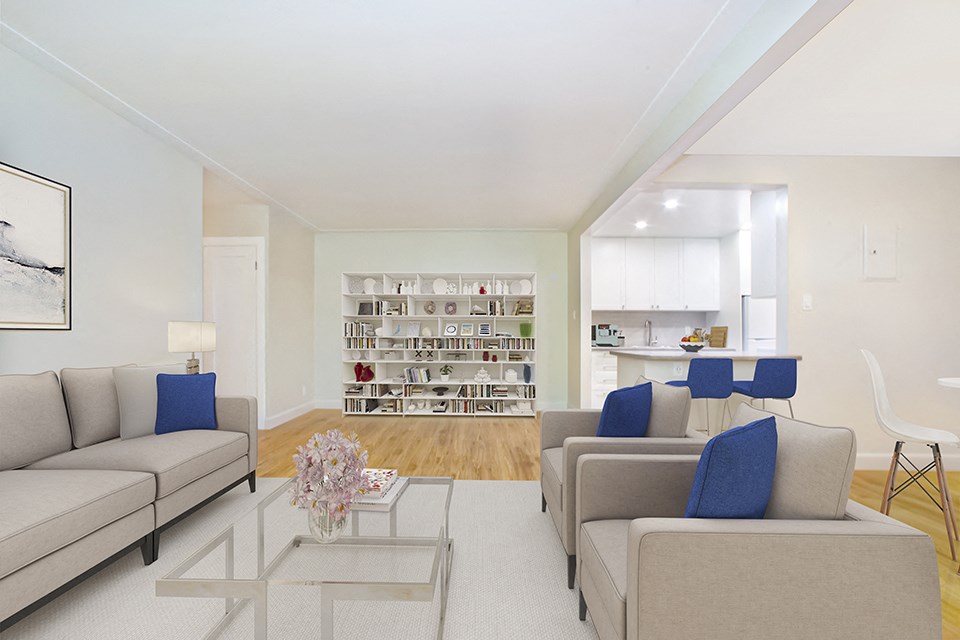 Park Towers Apartments living room with kitchen in background of a renovated 1 bedroom in 55 Carfrae building in London, ON