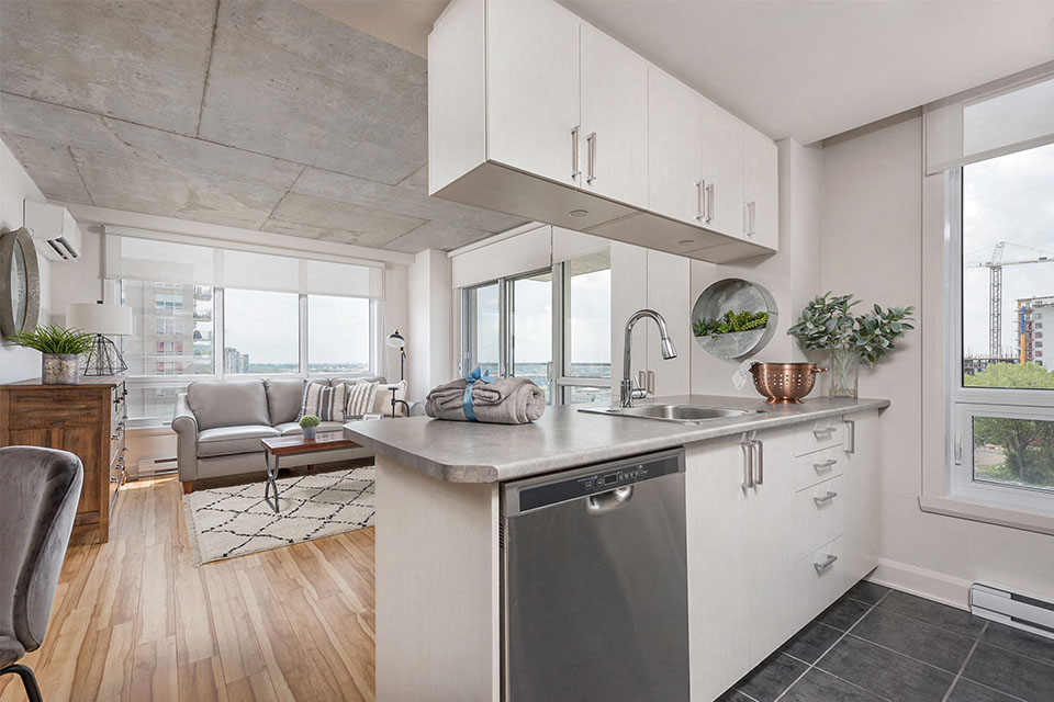 Open concept kitchen and living room at Axial Towers