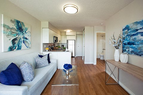 a living room with a couch and a table