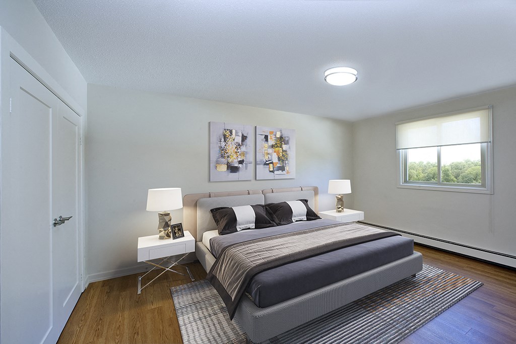 Regency Towers spacious bedroom with hardwood flooring in Owen Sound, ON