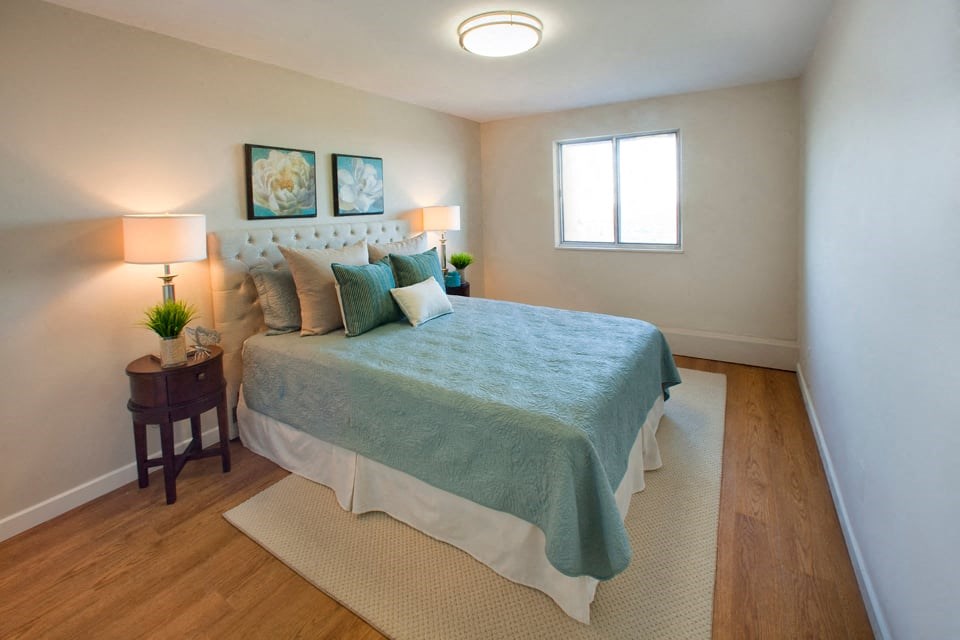 Regency Towers in St. Catharines spacious bedroom with hard surface flooring