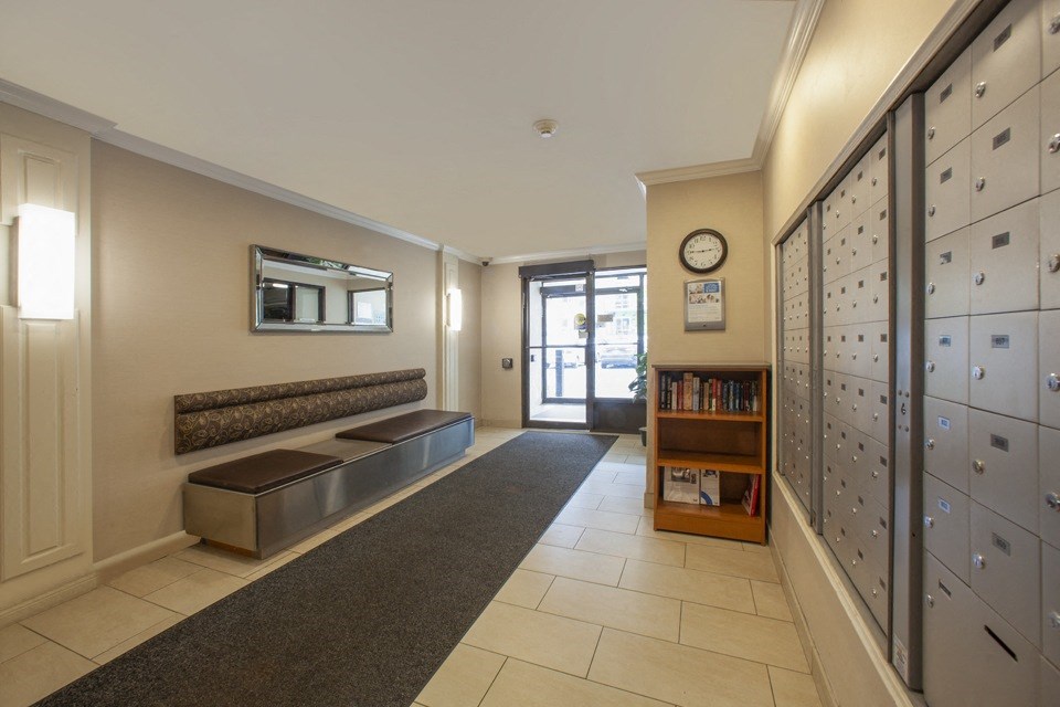 Lobby, looking towards main building entrance, at Riverbend Tower Apartments in Chatham, ON