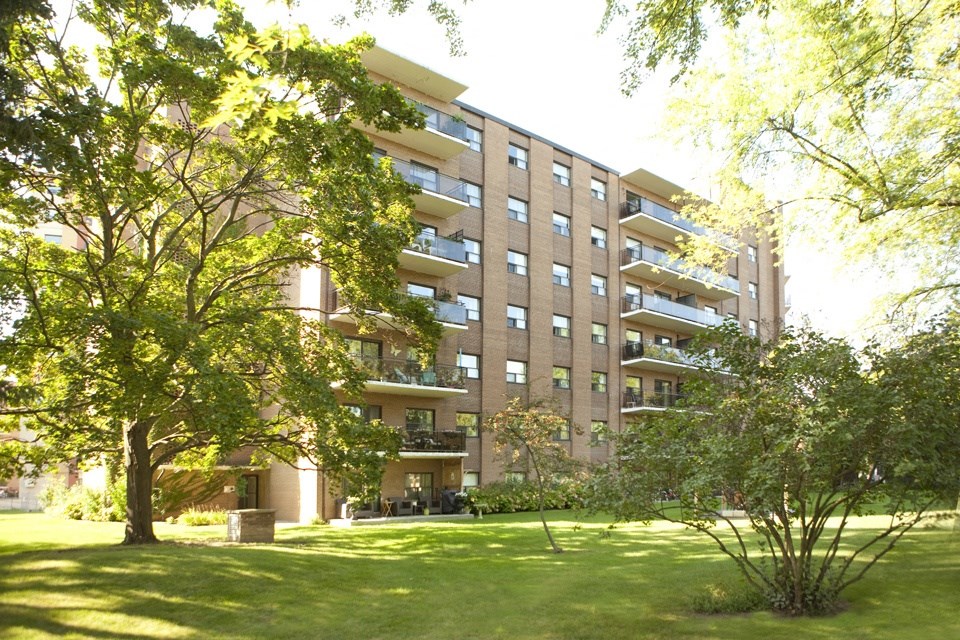 Rockliffe Park Suites building exterior featuring property grounds in Oakville, ON