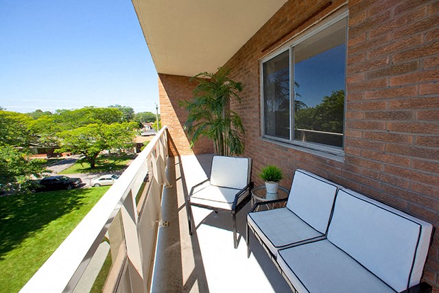 St. Lawrence Village in St. Catharines, ON Private balcony with chairs