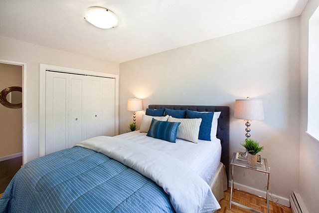St. Lawrence Village in St. Catharines, ON Well lit bedroom with closet