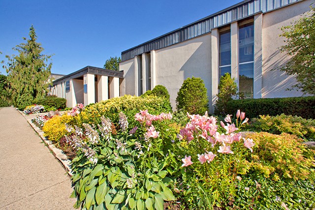 St. Lawrence Village in St. Catharines, ON Flowers outside of Rental Office