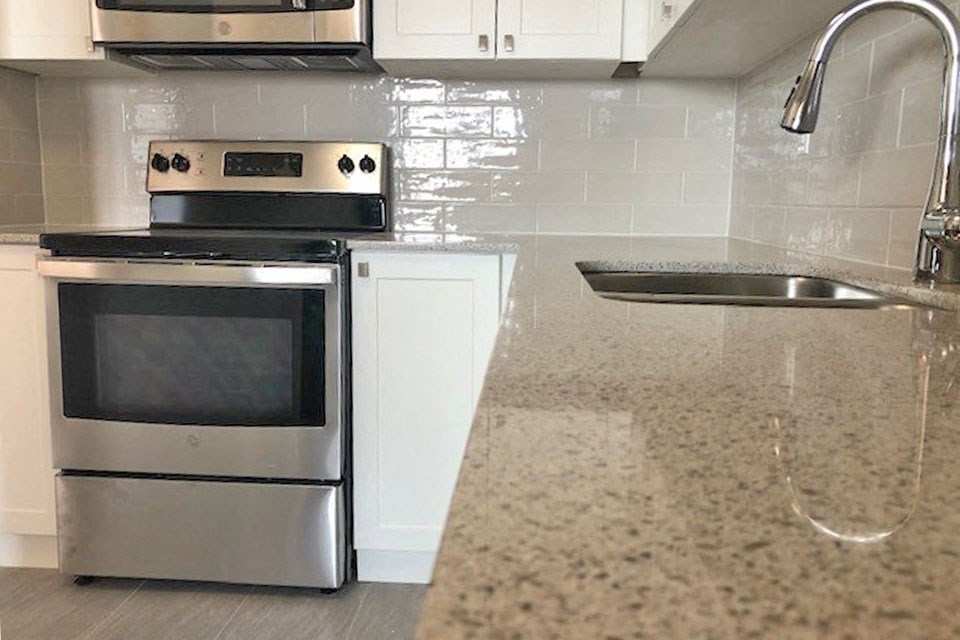 San Remo/Monaco in Toronto, ON upgraded kitchen with modern cabinetry and countertop finishes